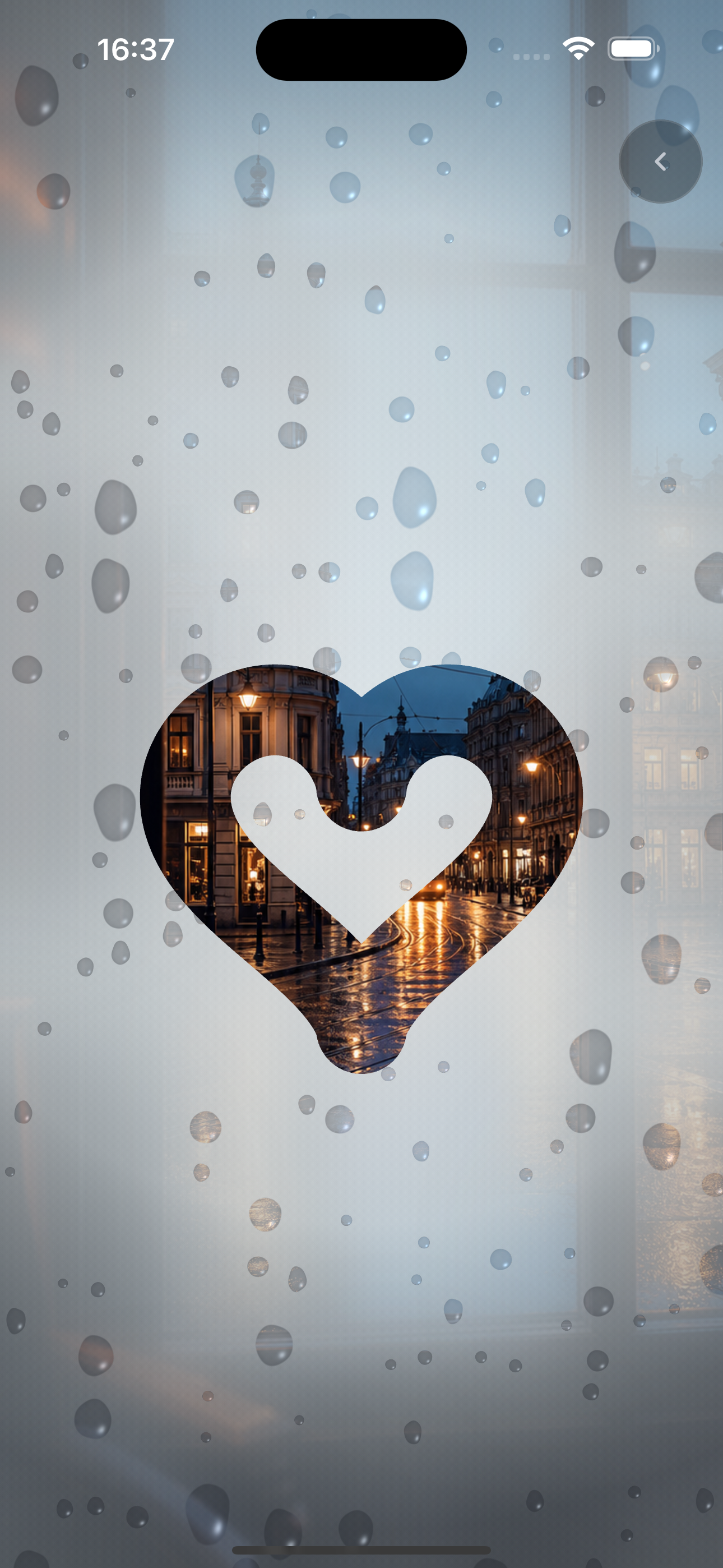 The Fogpane app with a heart drawn on a misted window, revealing a city at night